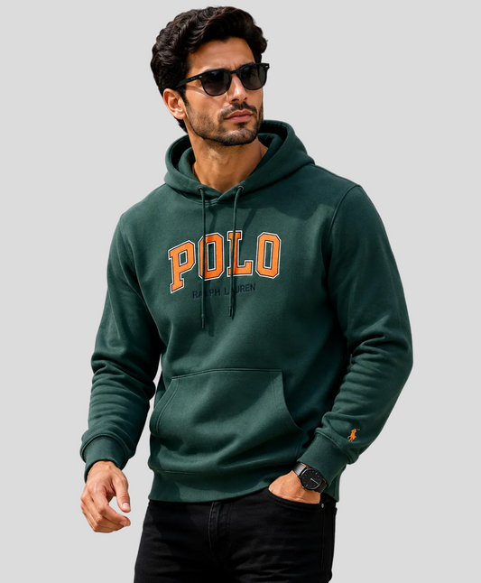 Man wearing a green hoodie with 'Polo' text, standing outdoors.